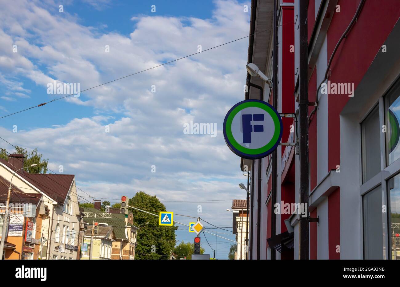 Rybinsk, Russia. 21.07. 2021. Fixed price luminous logo on the facade of the building. A Russian chain of stores with discounts and low prices. The ne Stock Photo