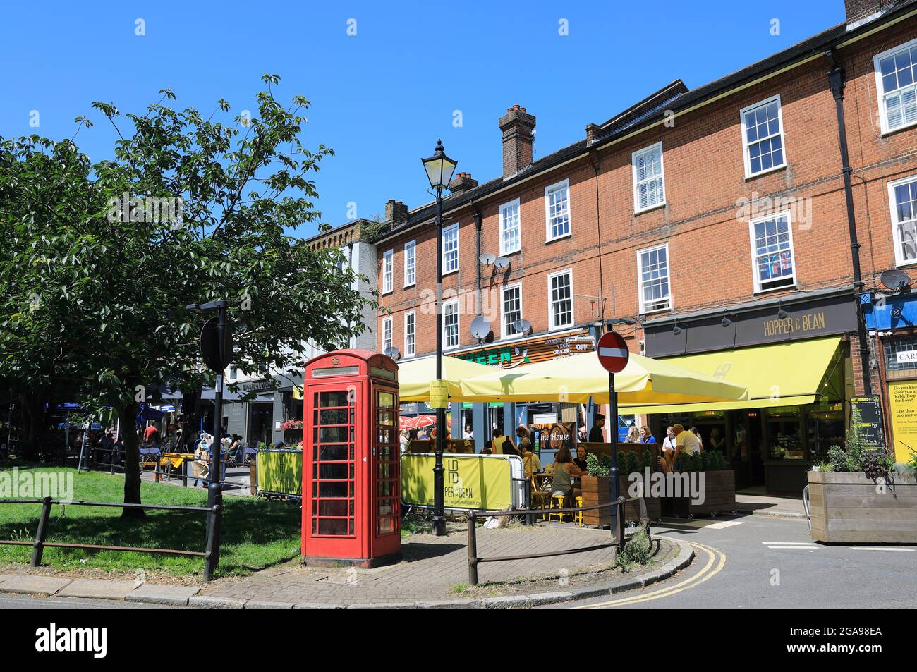 Restaurants and shops around the green at Winchmore Hill, a pretty
