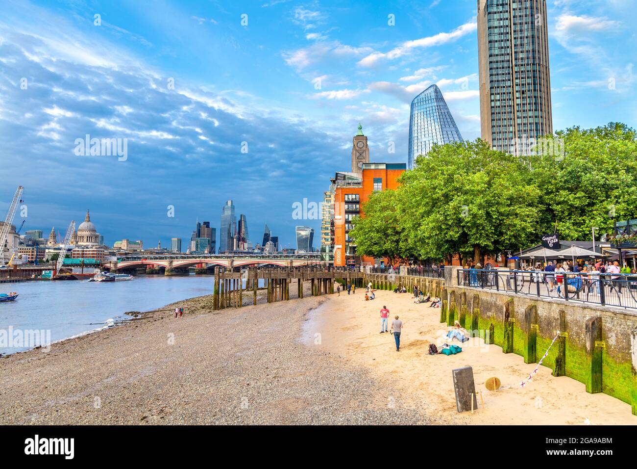 Thames beach along the Thames river and Southbank, London, UK Stock Photo