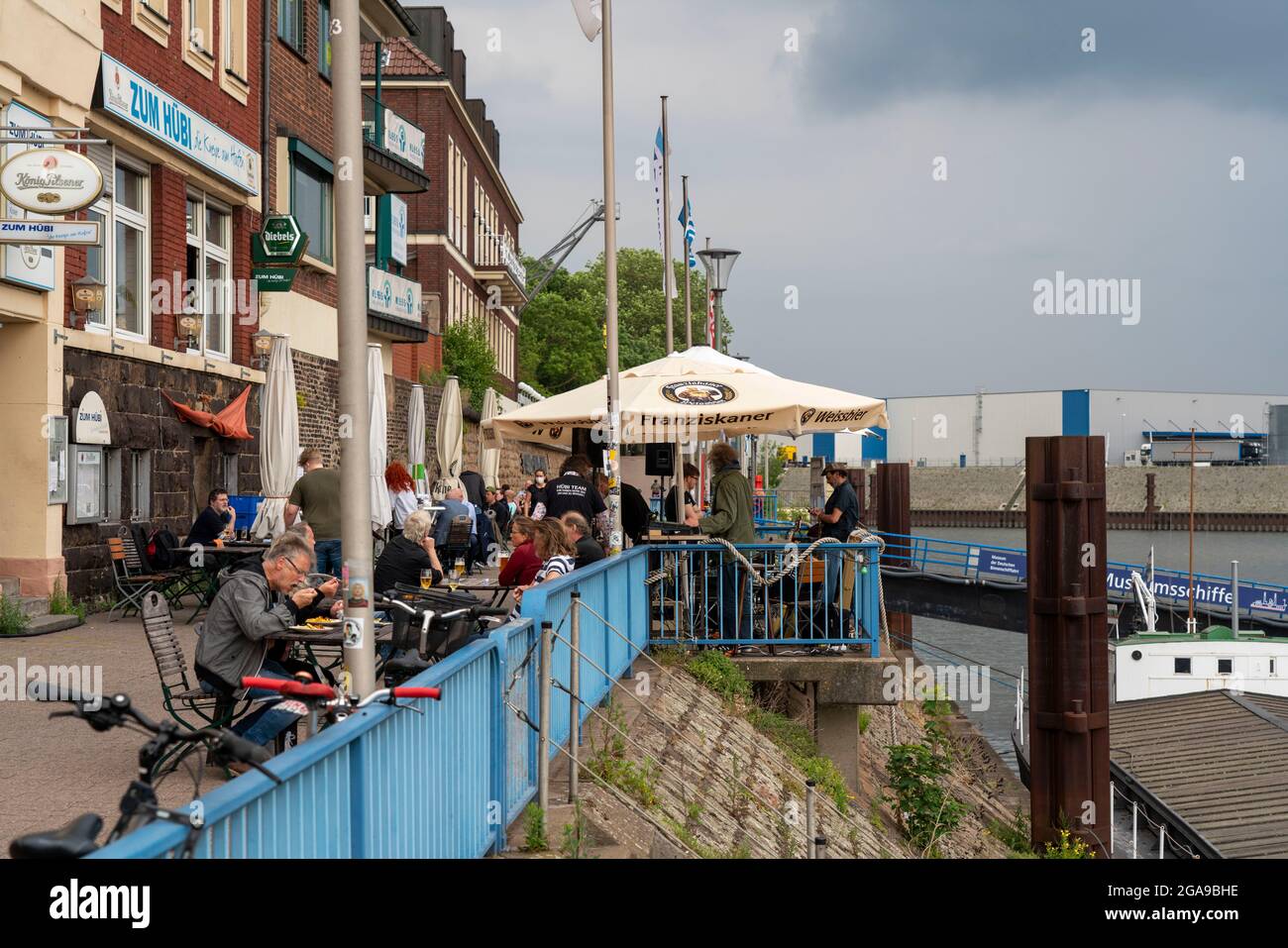 Port district Duisburg-Ruhrort, Horst-Schimanski-Gasse at the harbor, reminiscent of Tatort Kult Kommissar Schimi, port pub Zum Hübi, NRW, Germany, Stock Photo