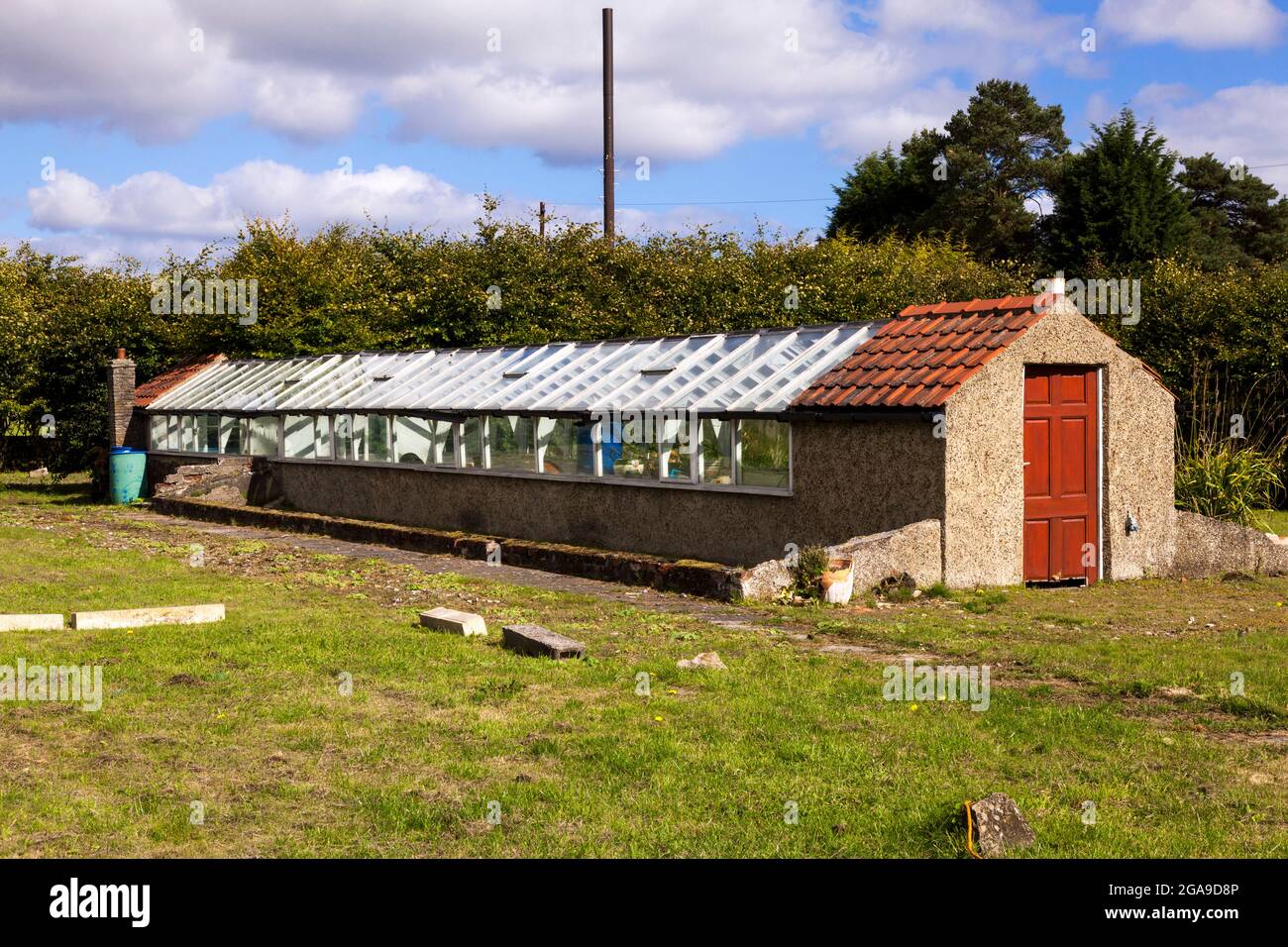 An old heated greenhouse in the village of Goathland, North Yorkshire, England, U.K. Stock Photo