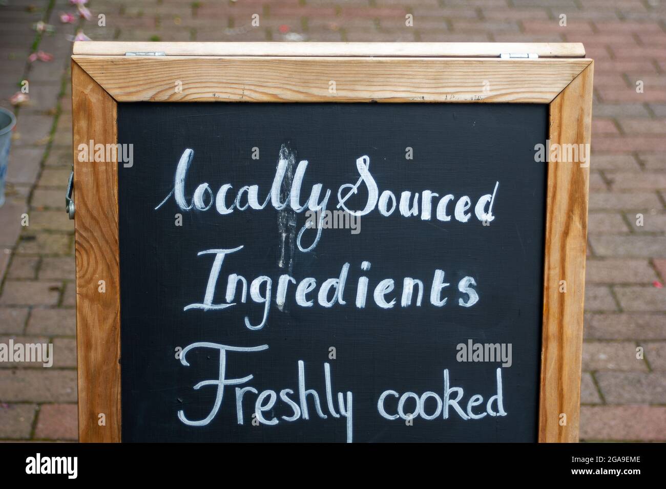 Chesham, Buckinghamshire, UK. 28th July, 2021. A locally sourced ingredients sign outside a pub in Chesham. Credit: Maureen McLean/Alamy Stock Photo