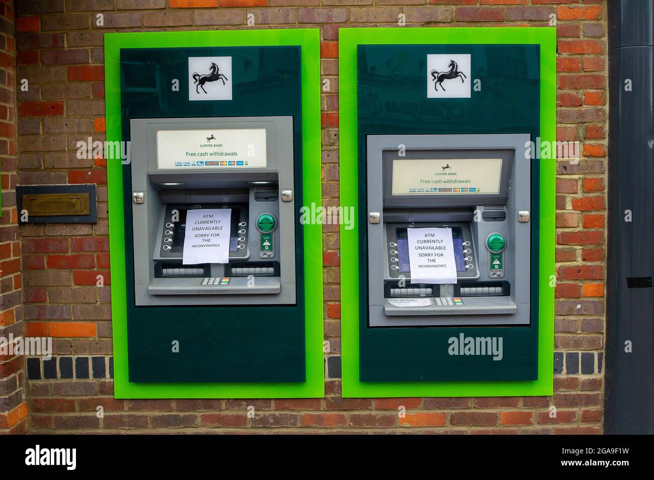 Chesham, Buckinghamshire, UK. 28th July, 2021. Shoppers in Chesham High Street today on market dayThe Lloyds Bank in Chesham closed early today and their cash point machines were also out of action. Credit: Maureen McLean/Alamy Stock Photo