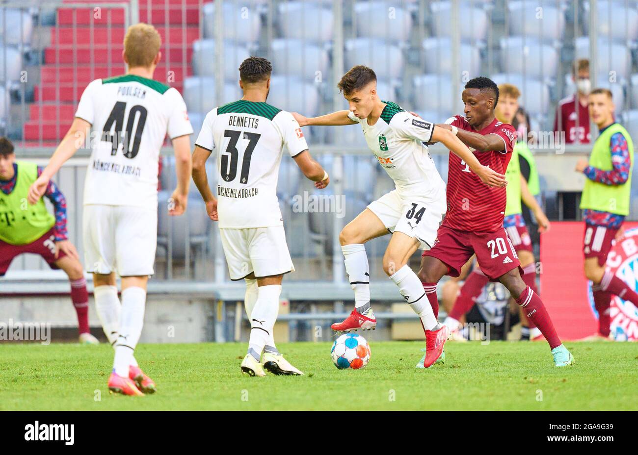 Bouna SARR, FCB 20  compete for the ball, tackling, duel, header, zweikampf, action, fight against Conor Noss, MG 34 Keanan BENNETTS, MG 37 Andreas Poulsen, MG 40  in the friendly match FC BAYERN MUENCHEN - BORUSSIA MÖNCHENGLADBACH 0-2  on July 28, 2021 in Munich, Germany  Season 2021/2022, matchday X, 1.Bundesliga, FCB, Gladbach, München, X.Spieltag. © Peter Schatz / Alamy Live News Stock Photo