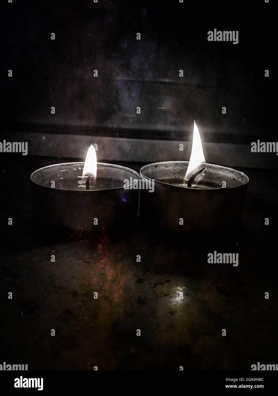 Candles on a window sill Stock Photo Alamy