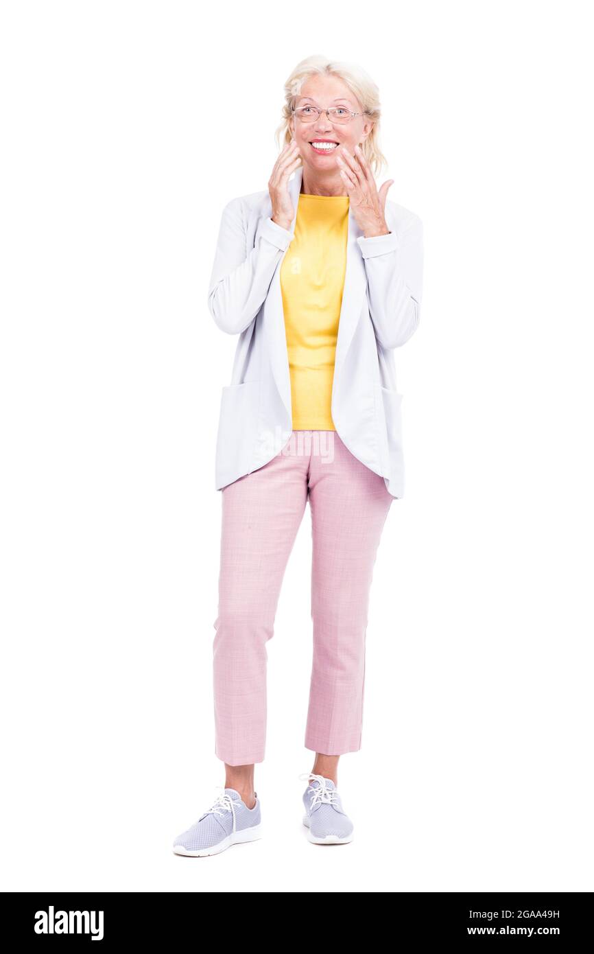 Vertical full body shot portrait of cheerful Caucasian woman enjoying ...