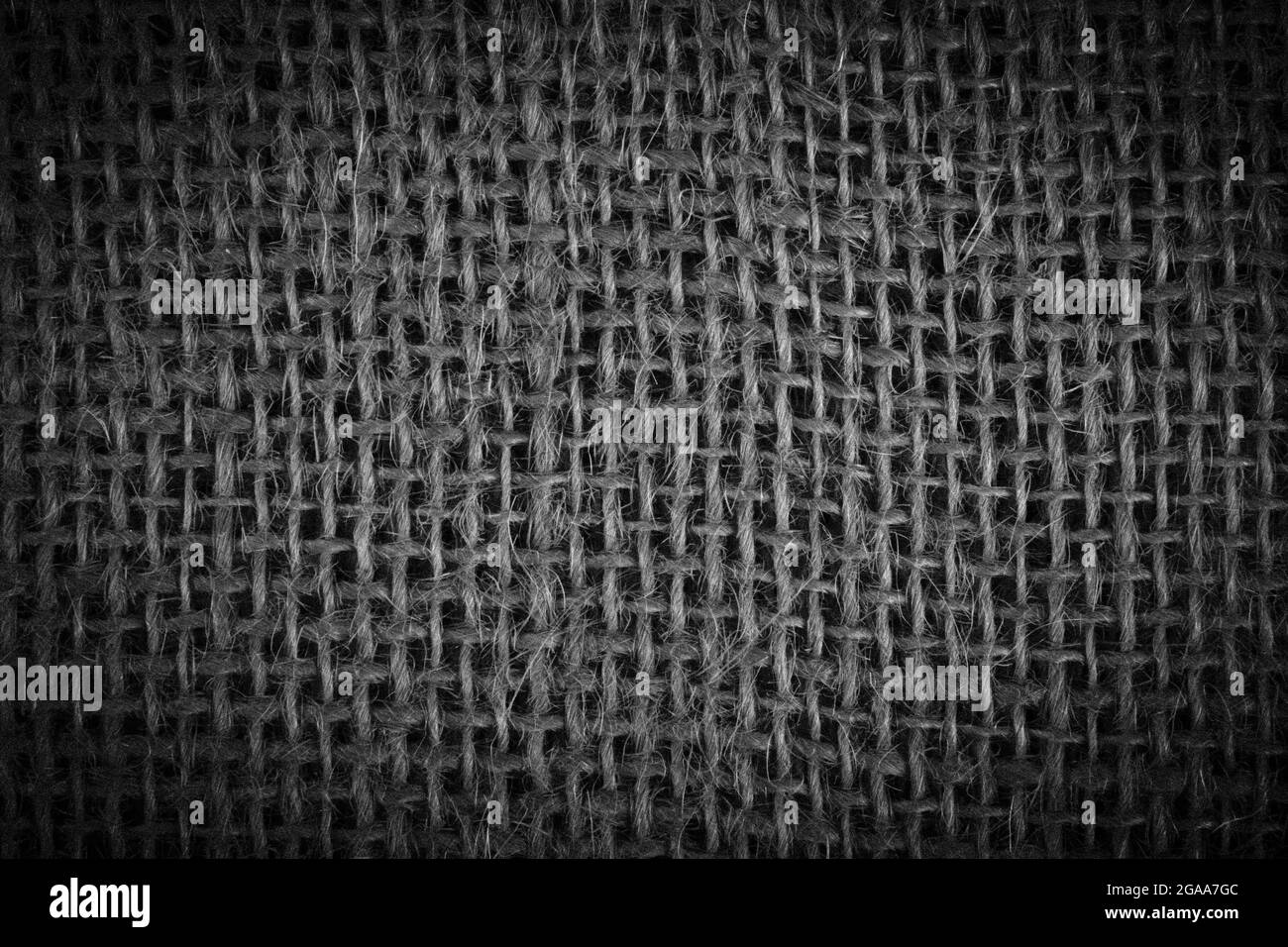 Linen cloth texture background. Black and white backdrop. Wrinkled