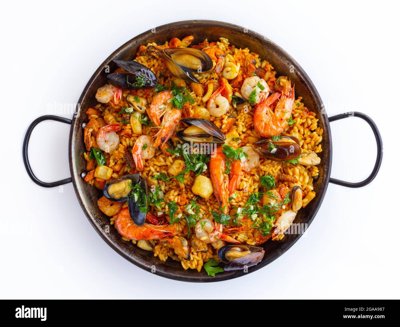 Traditional spanish seafood paella in the fry pan on a white background Stock Photo Alamy