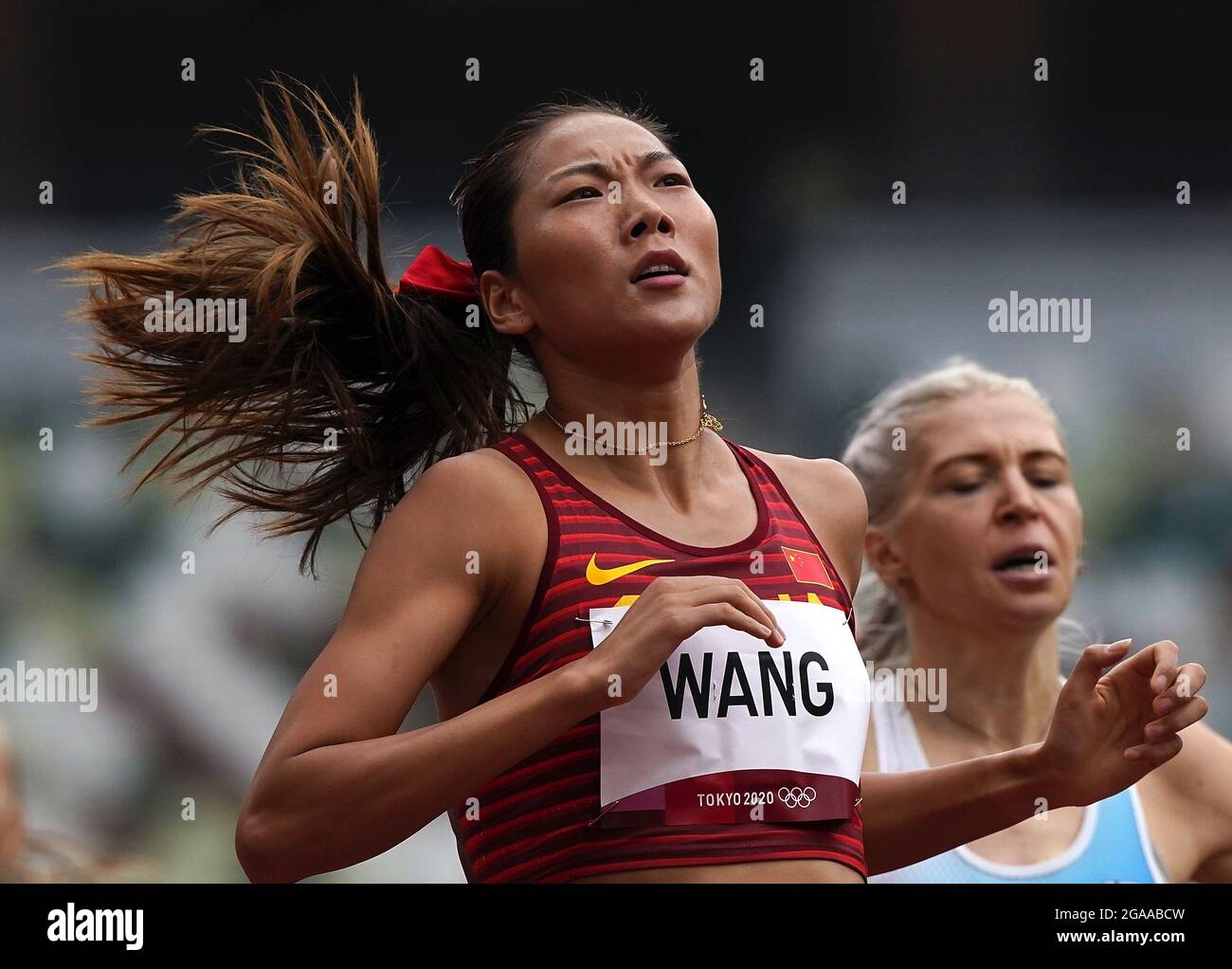 Tokyo, Japan. 30th July, 2021. Wang Chunyu (front) of China competes ...