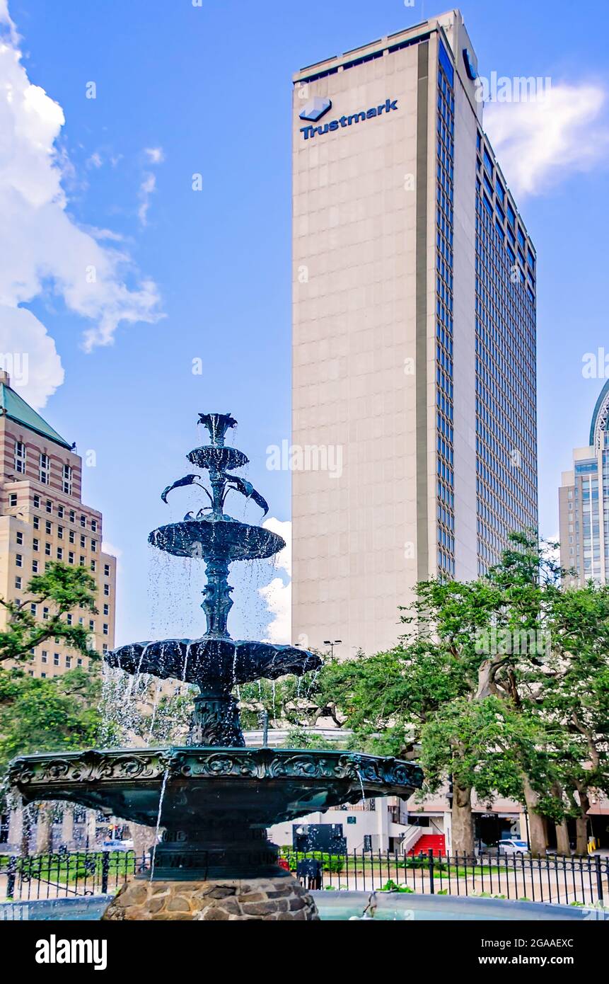 A three-tiered fountain is the centerpiece of Bienville Square, July 28, 2021, in Mobile, Alabama. Bienville Square was founded in 1824. Stock Photo