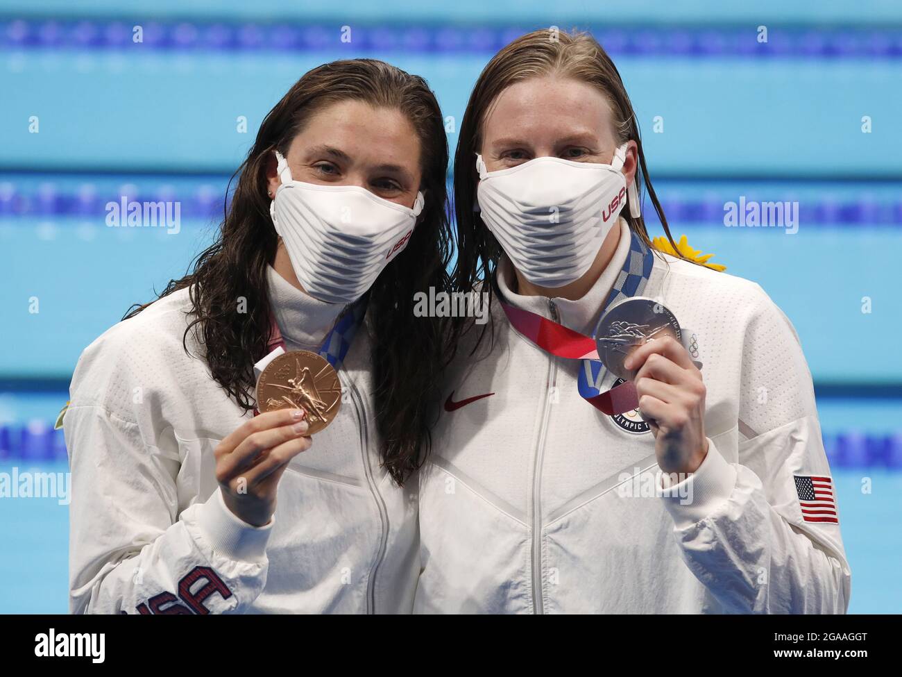 Tokyo, Japan. 29th July, 2021. USA's Bronze Medalist Annie Lazor (L) and Silver Medalist Lilly King pose for photographers following the Women's 200m Breaststroke Final at the Tokyo Aquatics Centre in Tokyo, Japan on Friday, July 30, 2021. South Africa's Tatiana Schoenmaker set a new world record of 2:18.95 winning the gold. Photo by Tasos Katopodis/UPI Credit: UPI/Alamy Live News Stock Photo