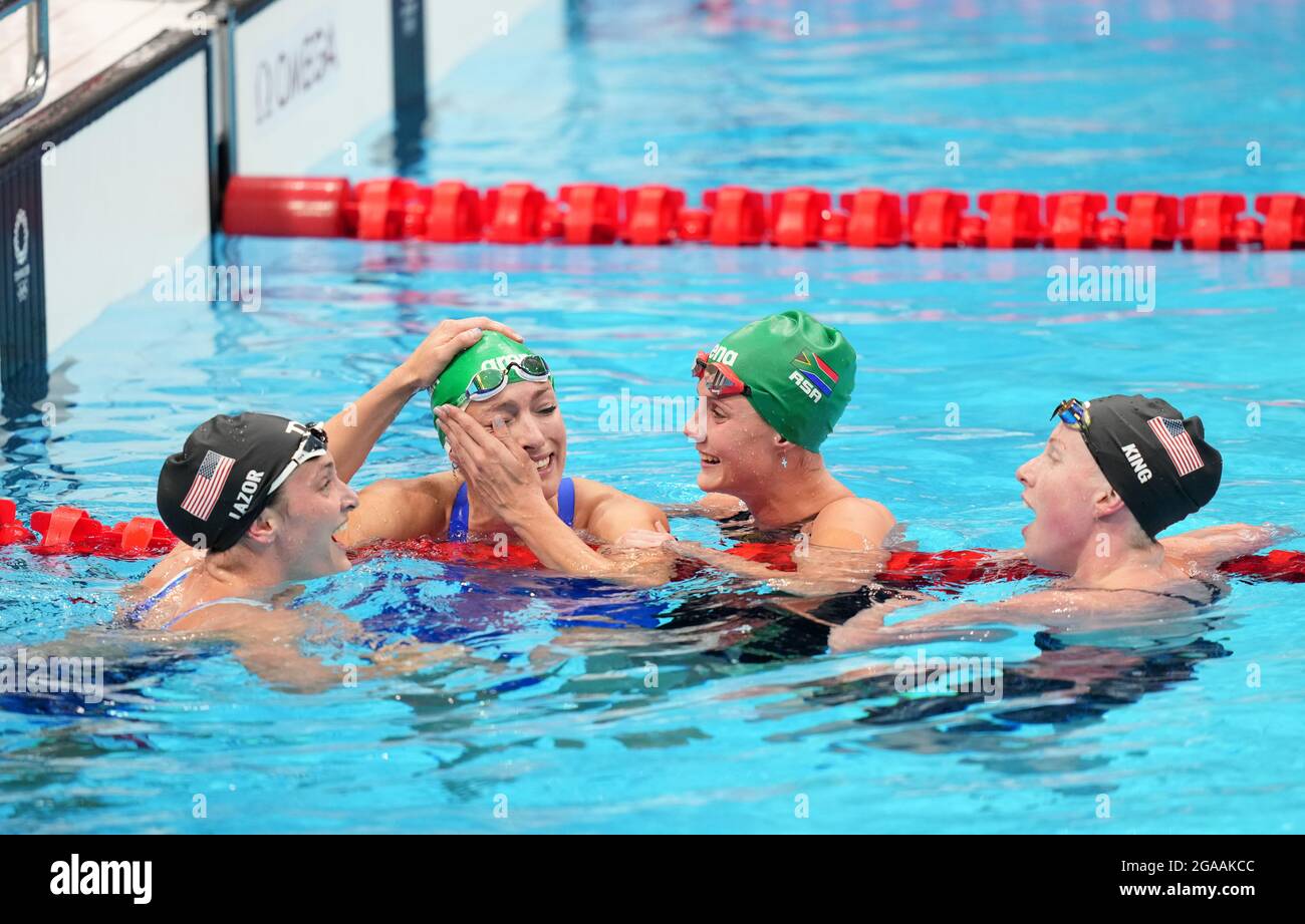 South Africa's Tatjana Schoenmaker congratulated by USA's Annie Lazor and Lilly King and Kaylene Corbett after victory in the Women's 200m Breaststroke Final at Tokyo Aquatics Centre on the seventh day of the Tokyo 2020 Olympic Games in Japan. Picture date: Friday July 30, 2021. Stock Photo