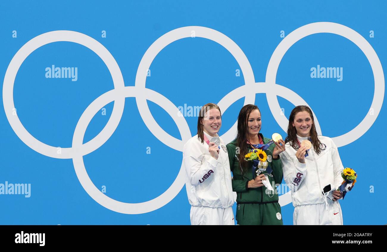 Tokyo, Japan. 30th July, 2021. Gold medalist Tatjana Schoenmaker (C) of South Africa, siver medalist Lilly King (L) and bronze medalist Annie Lazor of the United States pose for photos during the awarding ceremony after the women's 200m breaststroke final of swimming at the Tokyo 2020 Olympic Games in Tokyo, Japan, July 30, 2021. Credit: Ding Xu/Xinhua/Alamy Live News Stock Photo