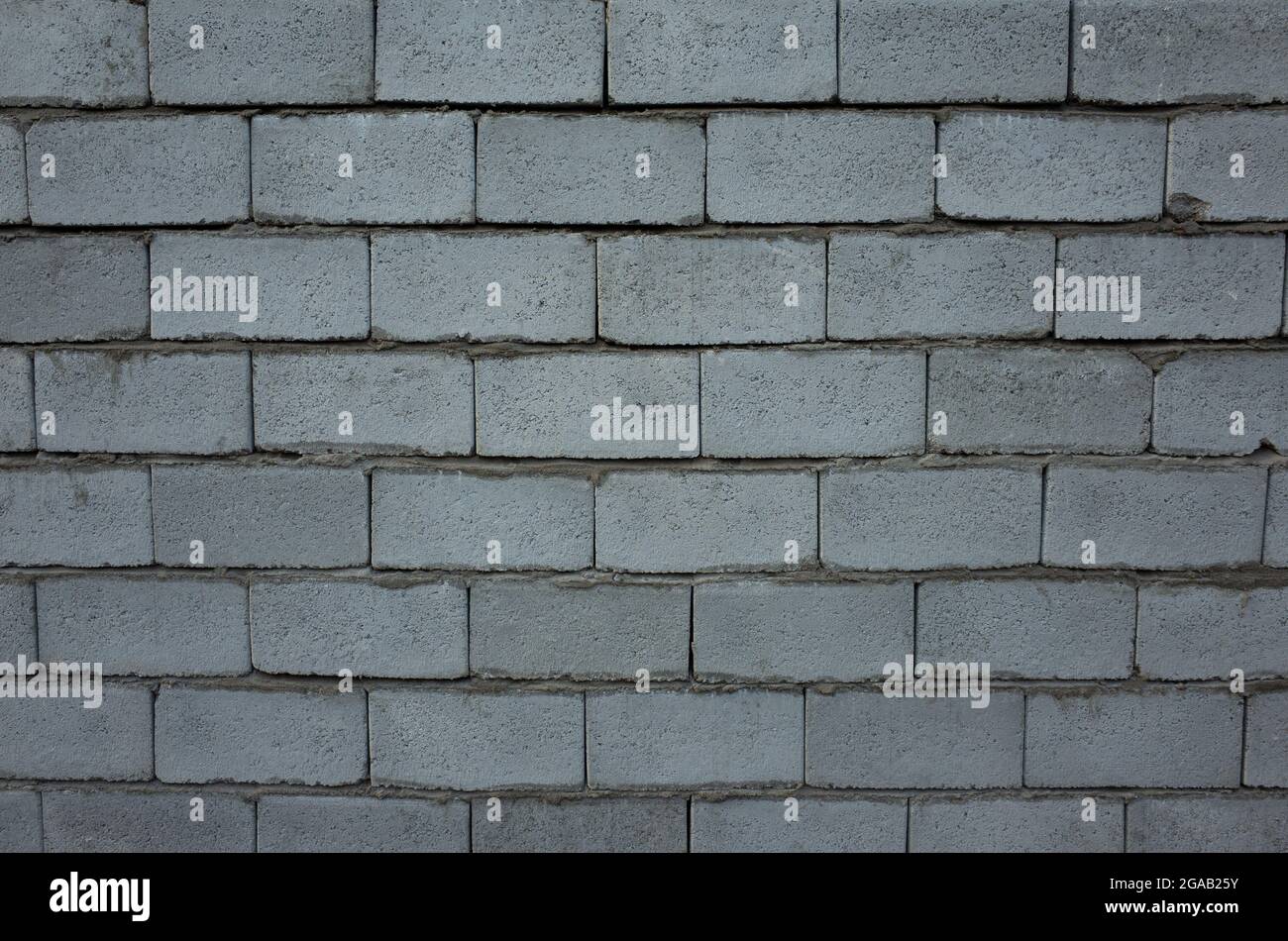 PHOTO of bricks of wall in the street Stock Photo