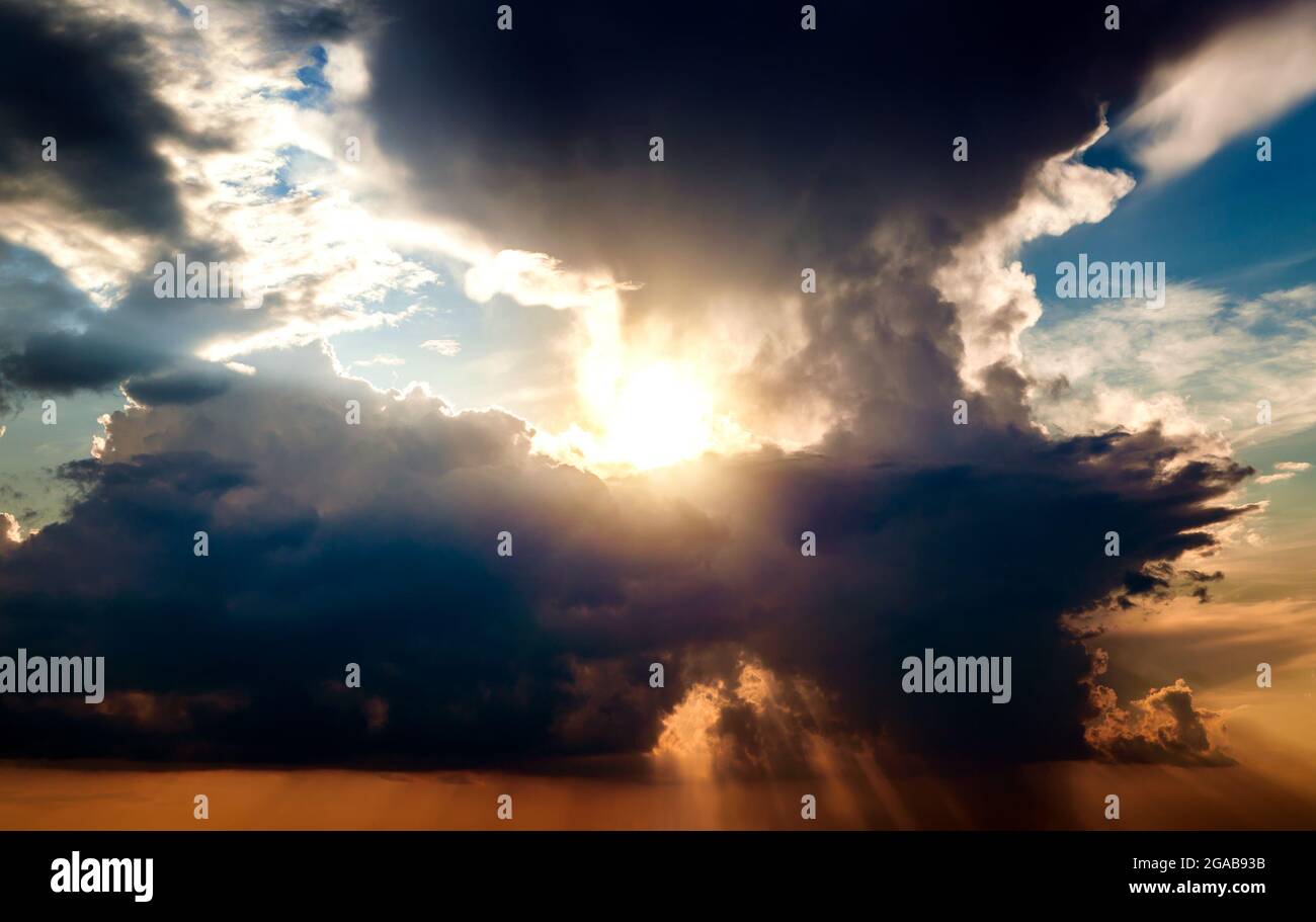Light in the Dark and Dramatic Storm Clouds Stock Photo - Alamy