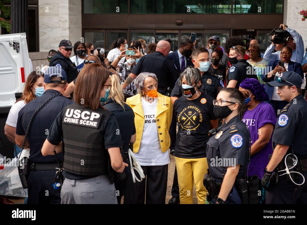 Washington, DC, USA. 29th July, 2021. Pictured: Dr. Johnnetta Cole and Arlene Holt-Baker are among the activists arrested in a civil disobedience action for voting rights. Activists blocked the entrance to the Hart Senate Building to protest the restriction of voting rights in state legislatures across the United States. Credit: Allison Bailey/Alamy Live News Stock Photo