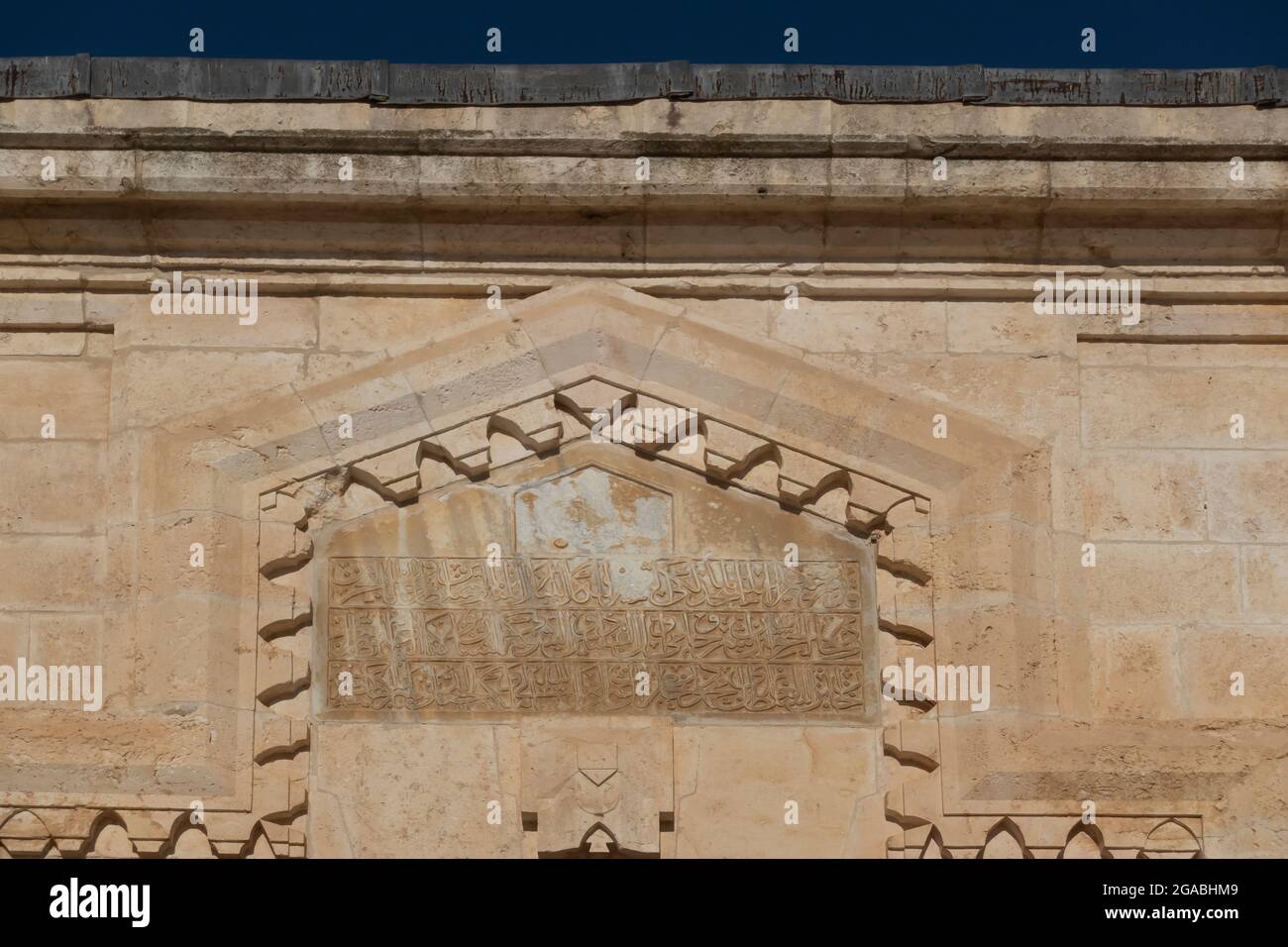 Mosques Arabic Inscription An Arabic inscription at the facade of Magharba Mosque which has been ...