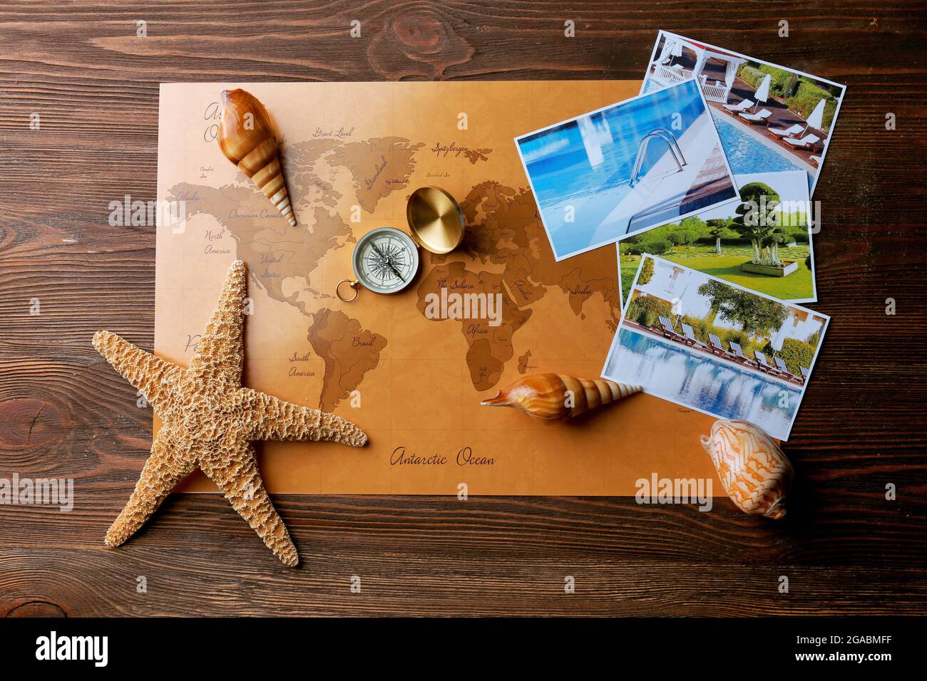 Marine composition with compass and cards on table close up Stock Photo ...