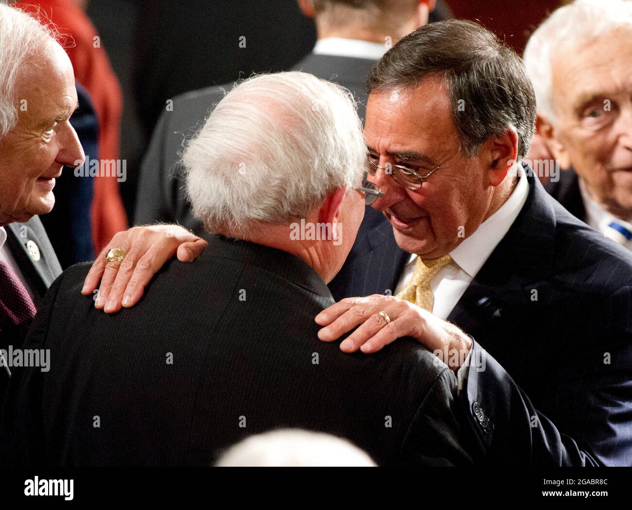 United States Secretary of Defense Leon Panetta shares a thought with U.S. Senator Carl Levin (Democrat of Michigan), Chairman of the U.S. Senate Armed Services Committee prior to President Barack Obama delivering his State of the Union Address to a Joint Session of Congress in the U.S. Capitol in Washington, D.C., Tuesday, January 24, 2012.  Looking on from left is U.S. Representative Sander Levin (Democrat of Michigan)..Credit: Ron Sachs / CNP/Sipa USA Stock Photo