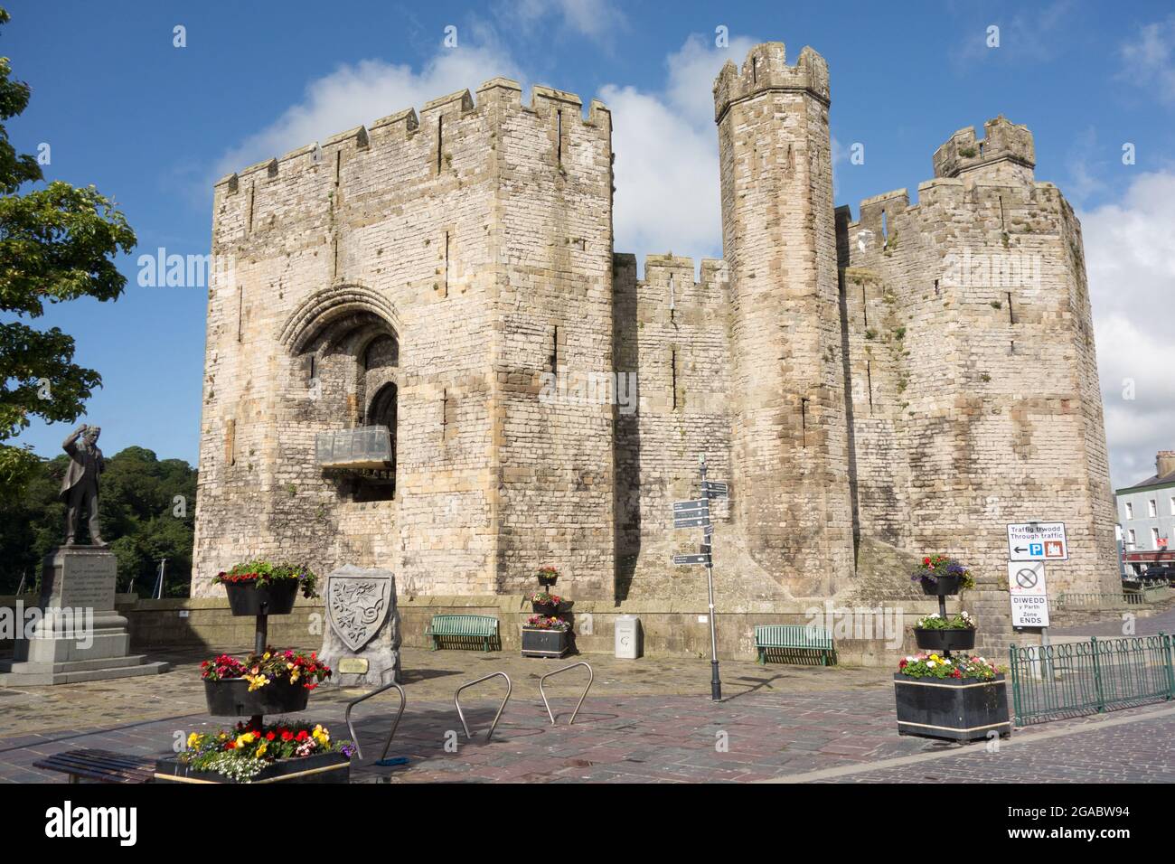 looking towards Caernarfon Castle Wales from Castle Square Stock Photo