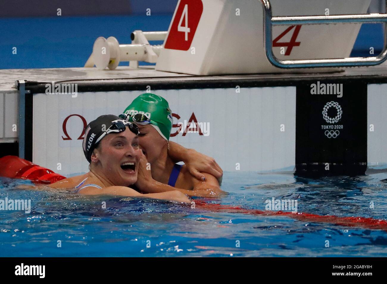 Tokyo, Kanto, Japan. 30th July, 2021. Annie Lazor (USA) and Tatjana Schoenmaker (RSA) after finishing the women's 200m breaststroke final during the Tokyo 2020 Olympic Summer Games at Tokyo Aquatics Centre. (Credit Image: © David McIntyre/ZUMA Press Wire) Stock Photo