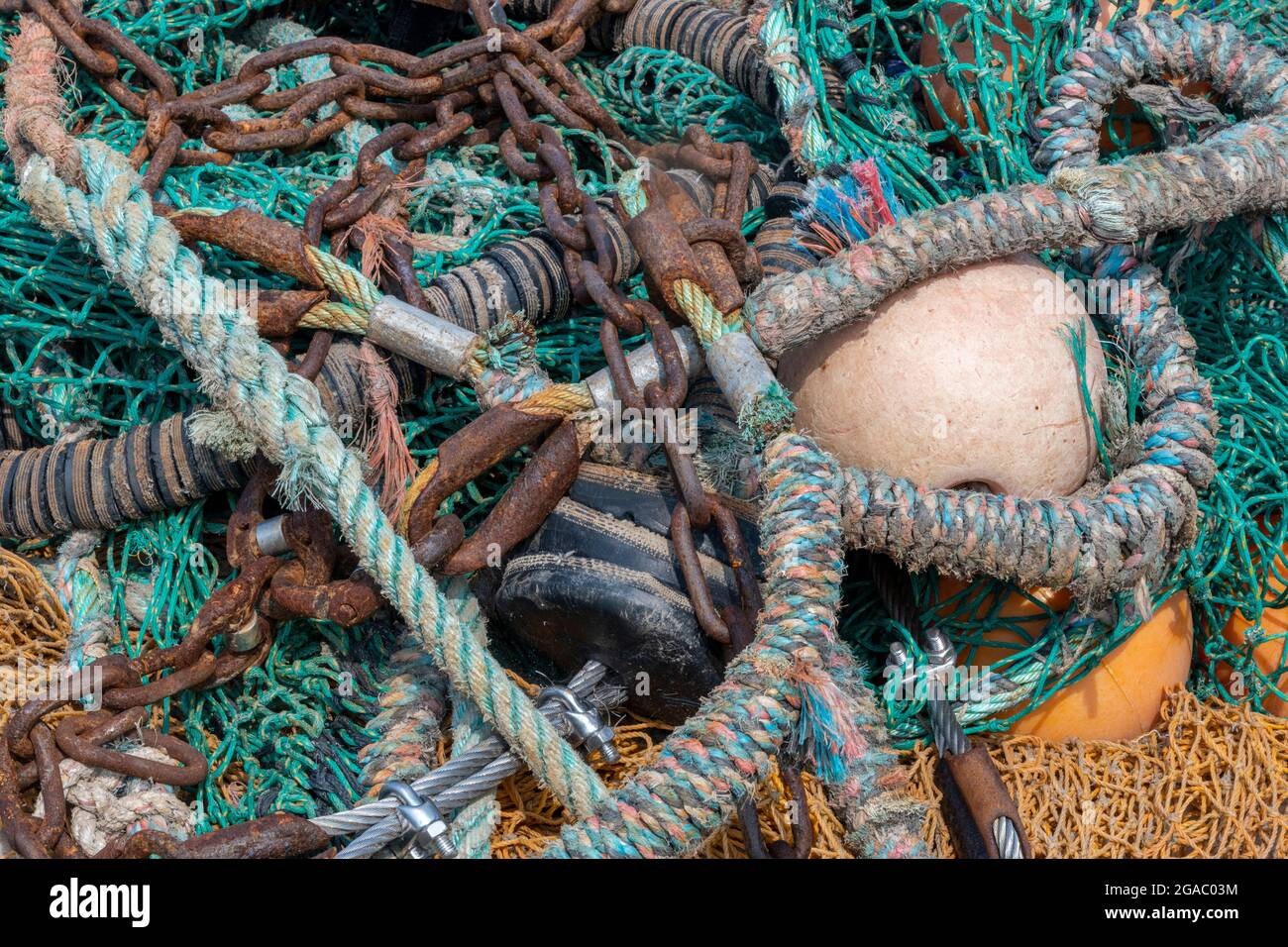 ropes and chains, fishing gear, fishing nets and chains, fishing equipment,  fishing trawler nets and wires, background, abstract fishing nets Stock  Photo - Alamy