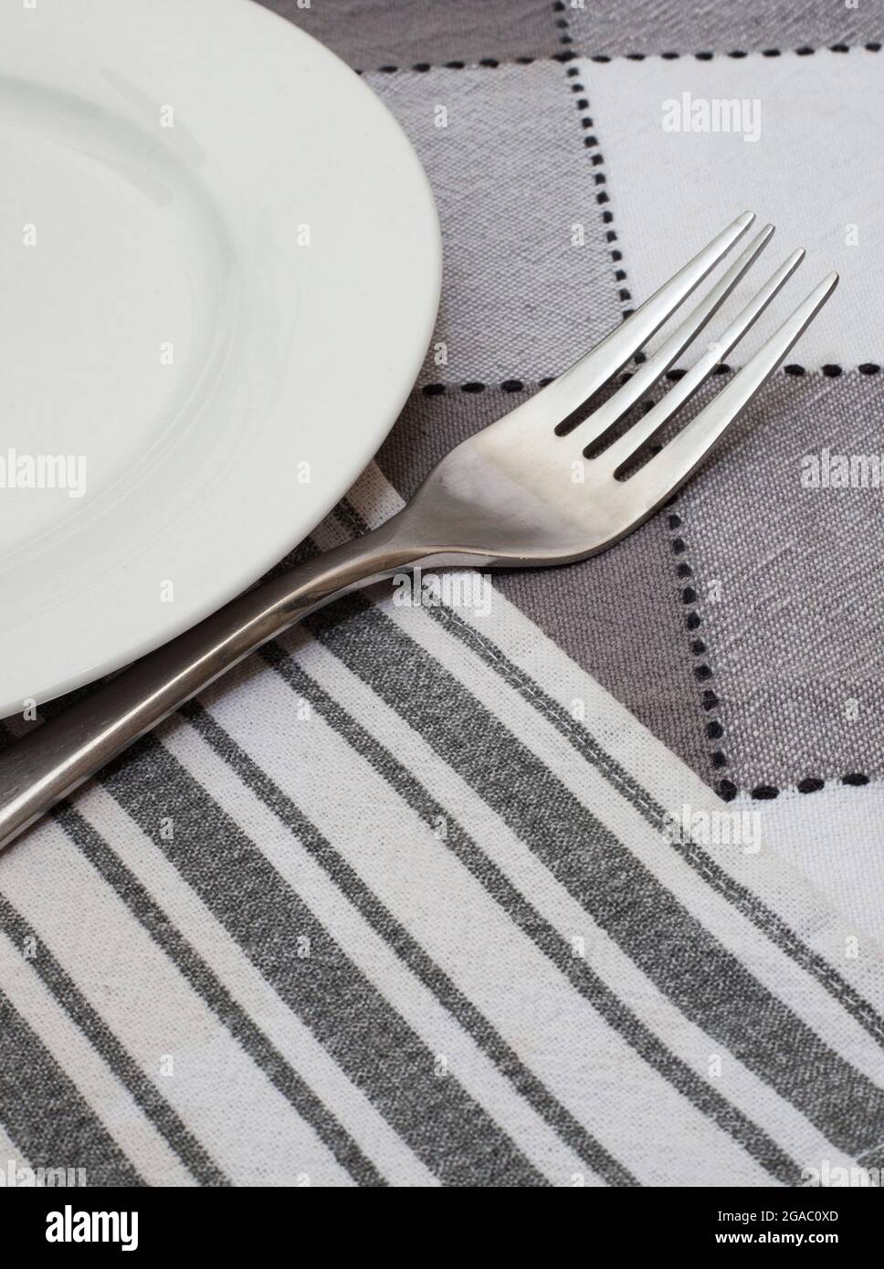 monotone tablecloths with with plate Stock Photo