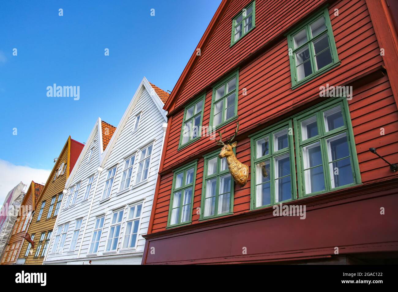 Colourful wooden houses of Bryggen the old wharf historic harbour district of Bergen, Norway. Its a Unesco World heritage listed. Stock Photo