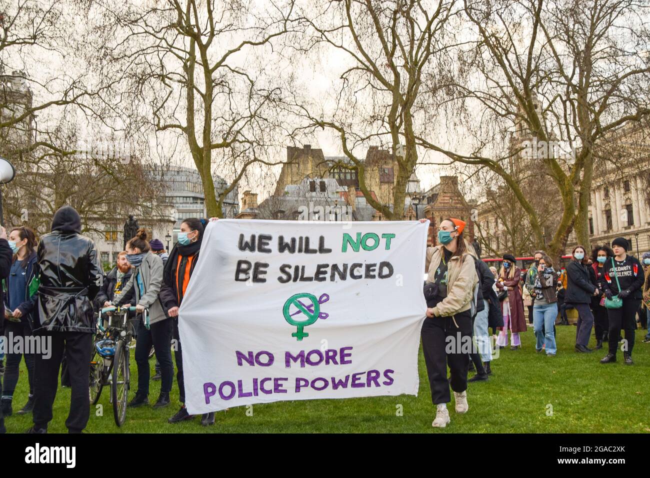 Demonstrators hold a 'No More Police Powers' banner at the Reclaim These Streets protest in Parliament Square. Crowds gathered in London to protest the heavy-handed response by the police at the Sarah Everard vigil, as well as the government's new Police, Crime, Sentencing and Courts Bill, which would give the police new powers to deal with protests. London, United Kingdom 15 March 2021. Stock Photo