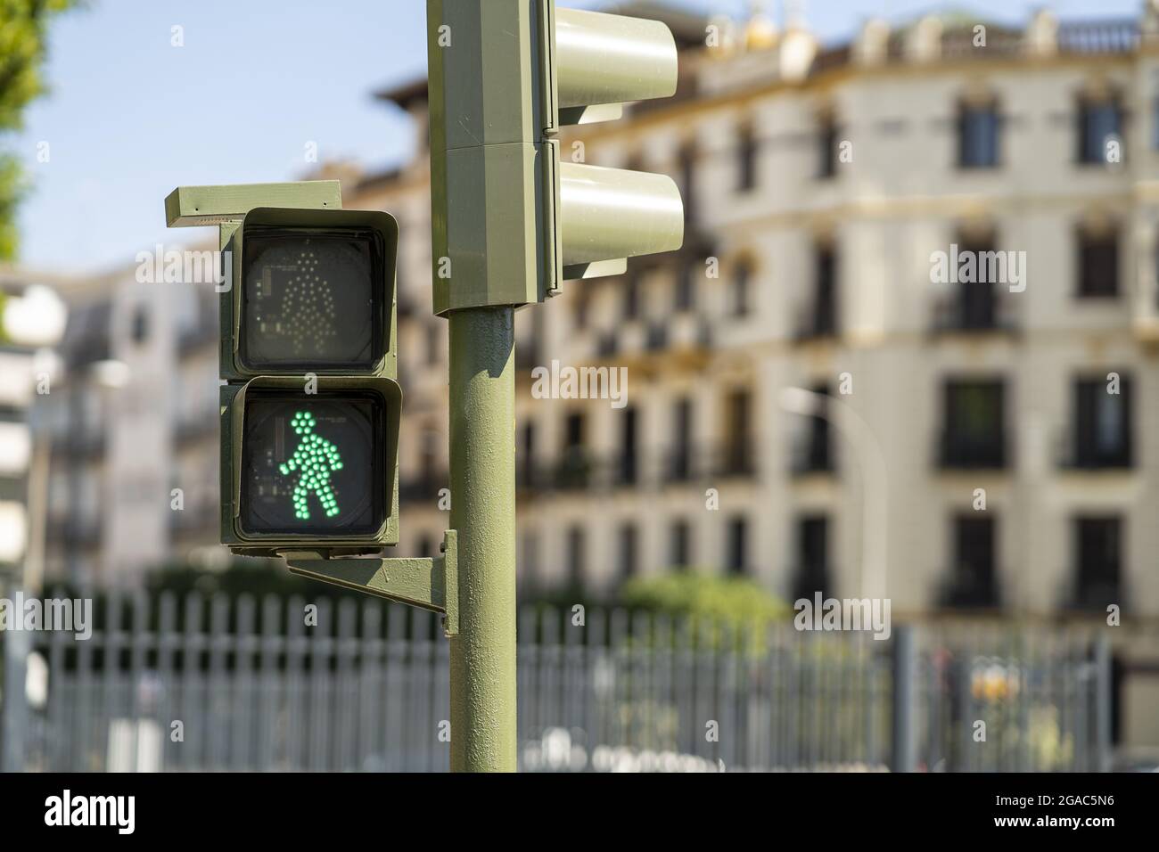 Closeup shot of a pedestrian traffic light showing green light Stock ...