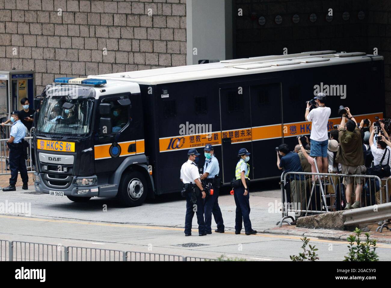 A prison van carrying Tong Ying-kit, the first person charged under the new  national security law, leaves the High Court after Tong was sentenced to 9  years, in Hong Kong, China. July