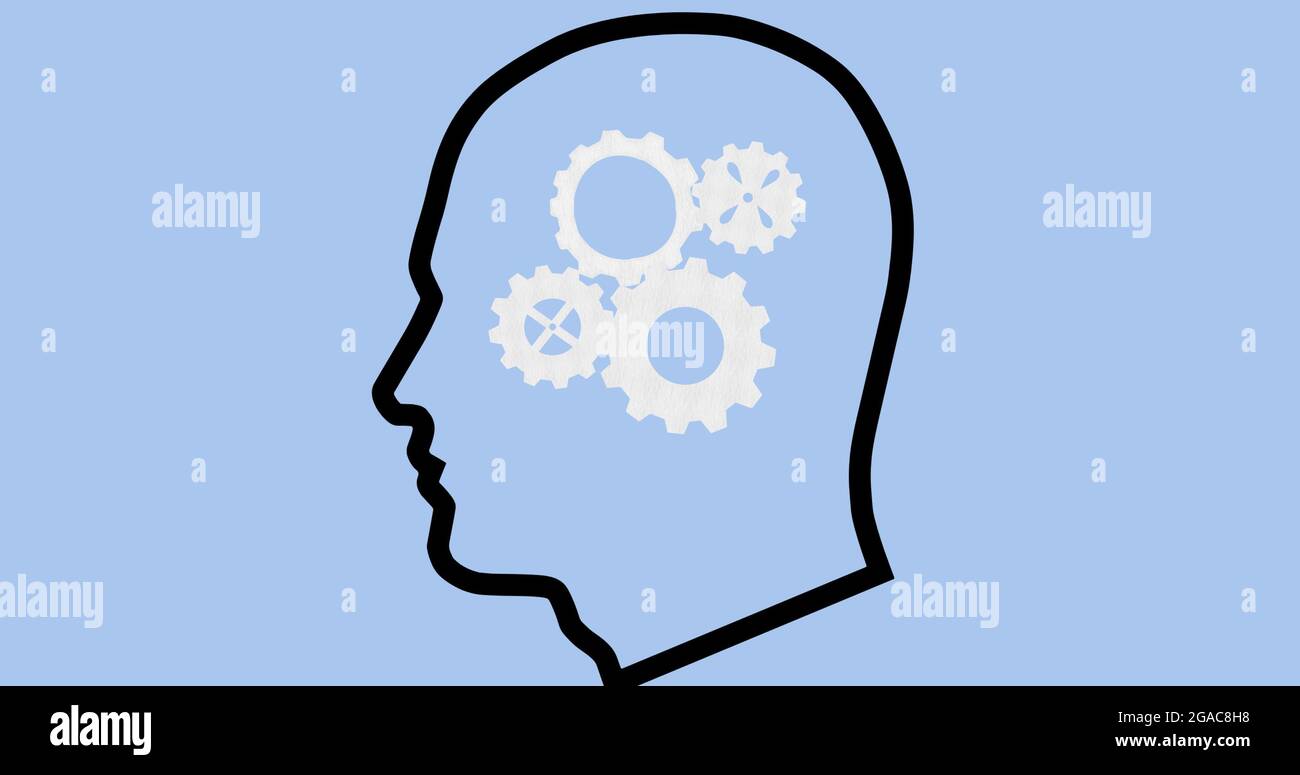 Composition of head silhouette with cogwheels inside on blue background Stock Photo