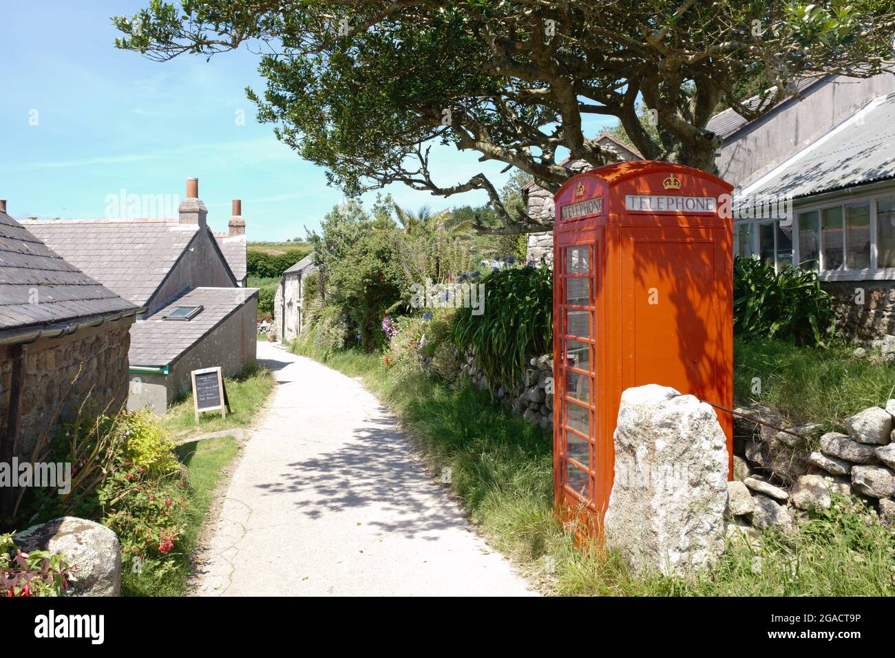 Red phone box, St Martin's island, Isles of Scilly, Cornwall, England, UK, July 2021 Stock Photo