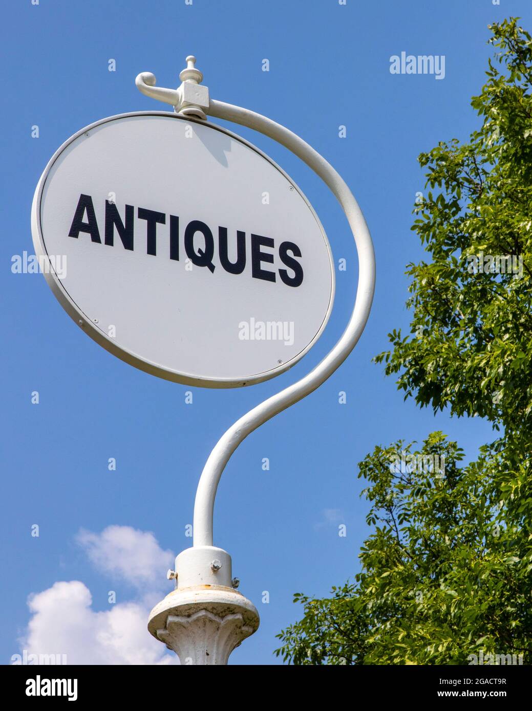 Antiques sign in the village of Battlesbridge in Essex, UK. Stock Photo