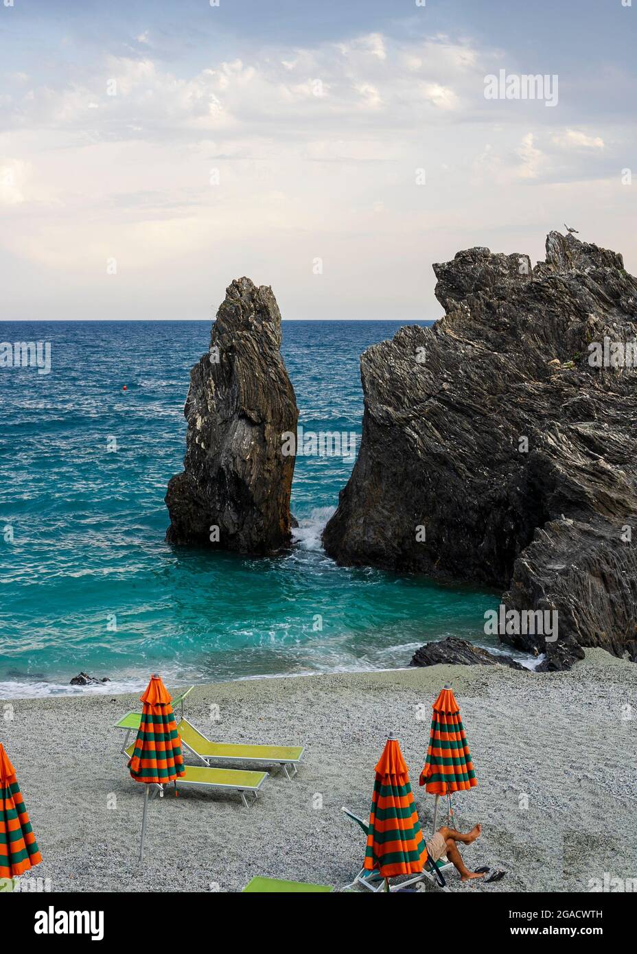 Faraglioni in the Cinque Terre - Monterosso al Mare - Liguria. Sunset Stock Photo