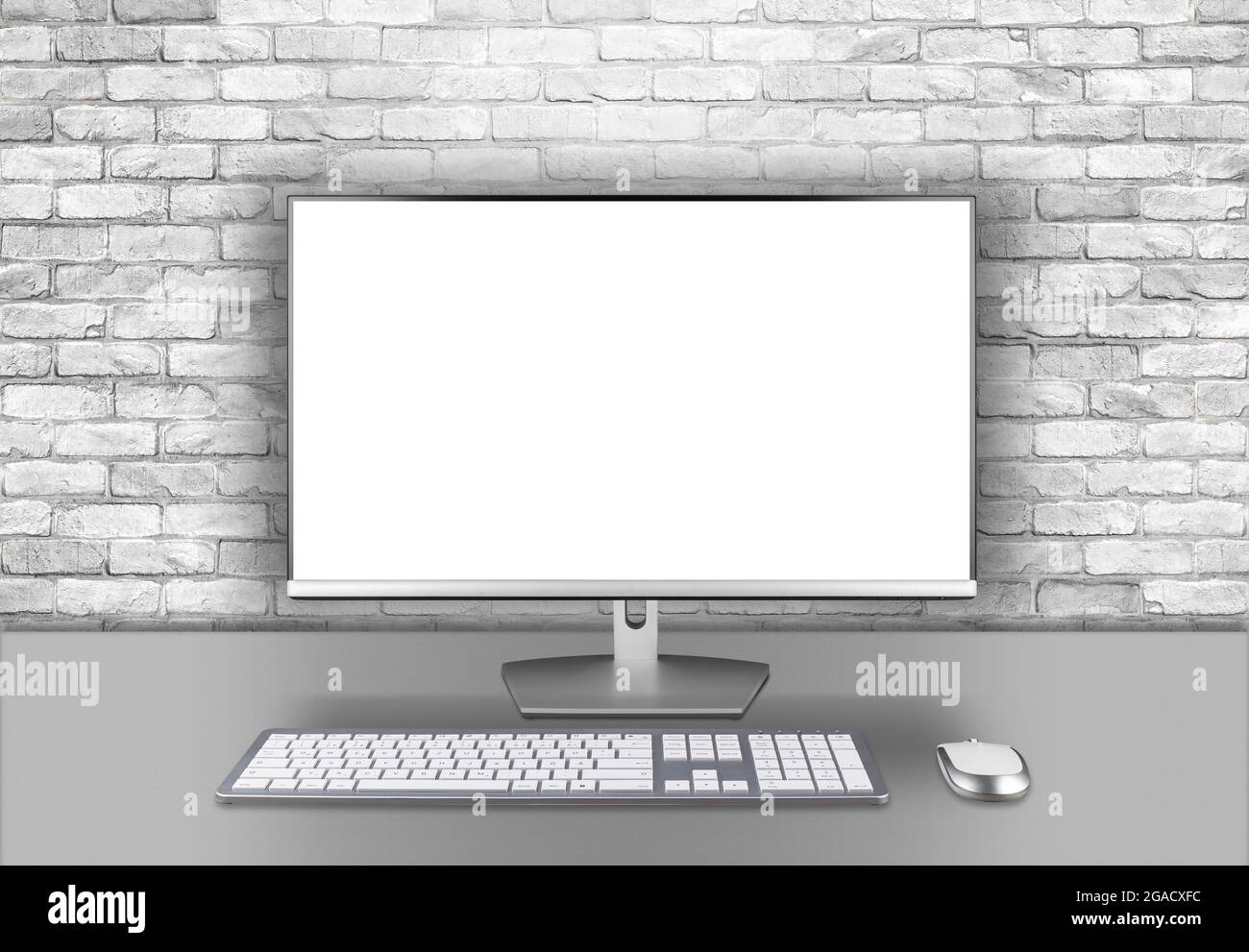 Modern silver black LED computer flat screen display monitor isolated work desk brick wall background. pc hardware electronics technology concept Stock Photo