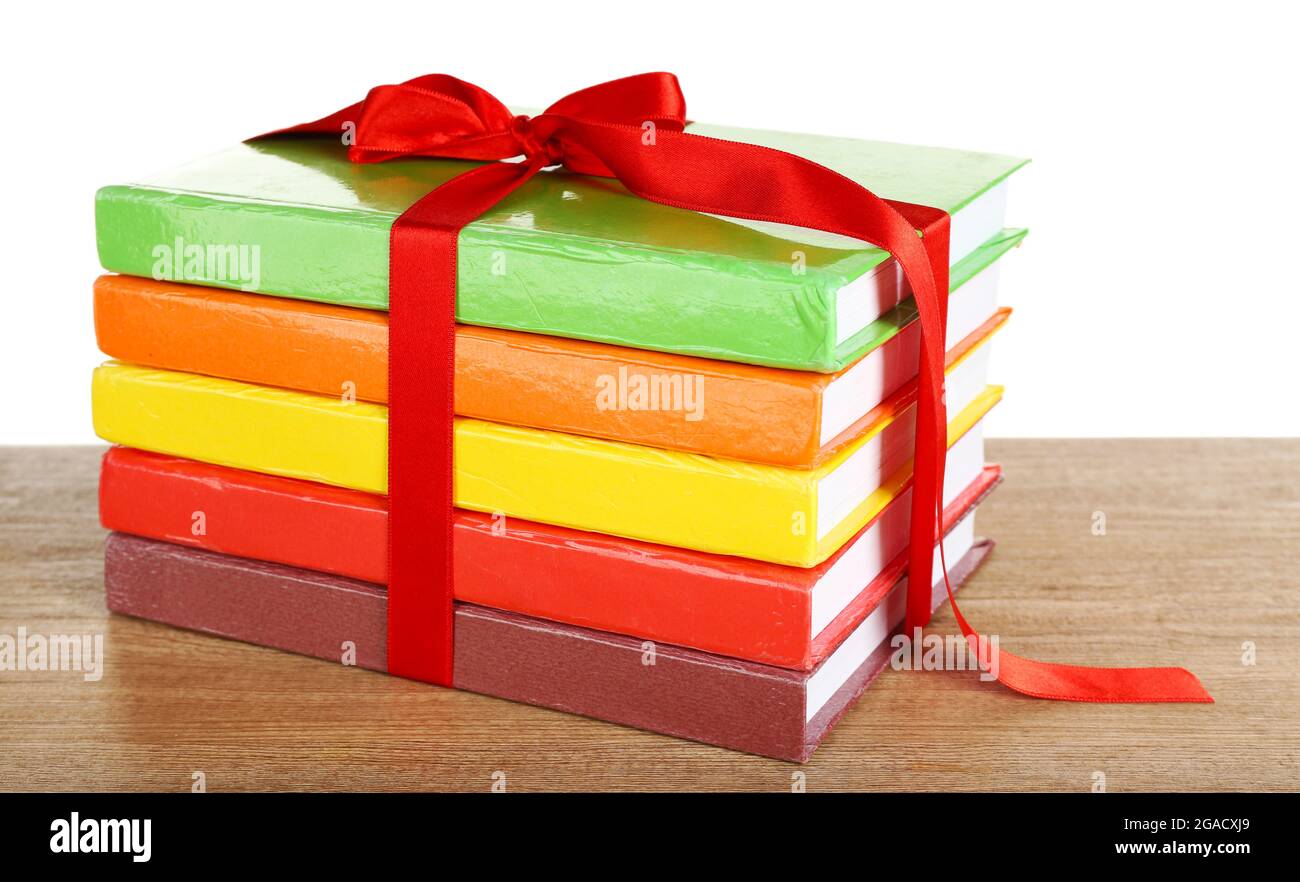 Book Stack With Ribbon Mark Stack of books with ribbon on light background Stock Photo - Alamy