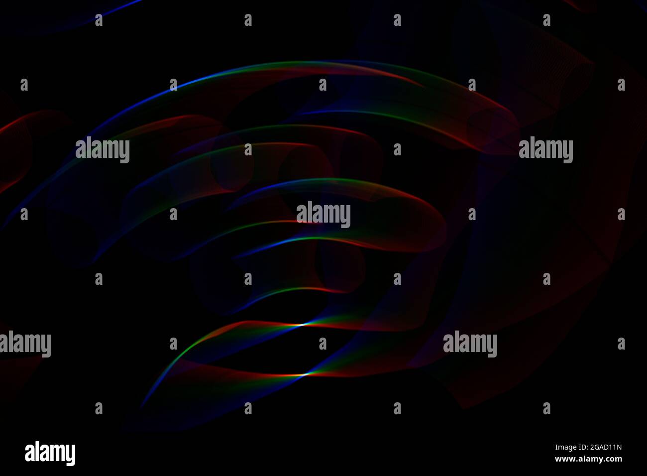 Abstract black background with rainbow highlights of light Stock Photo ...