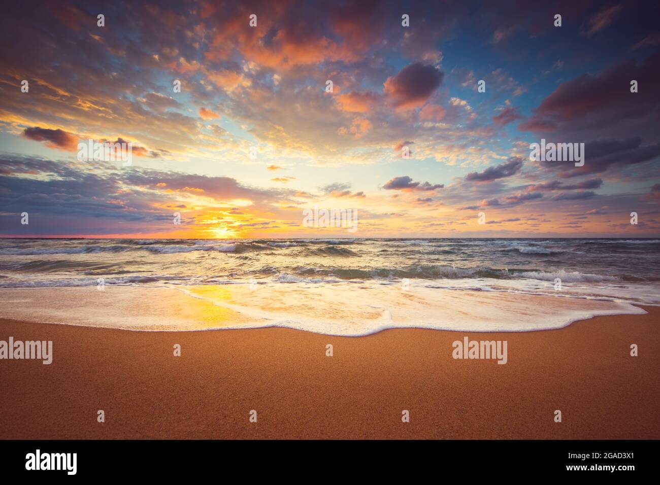 Dramatic cloudscape over the sea, sunrise shot Stock Photo