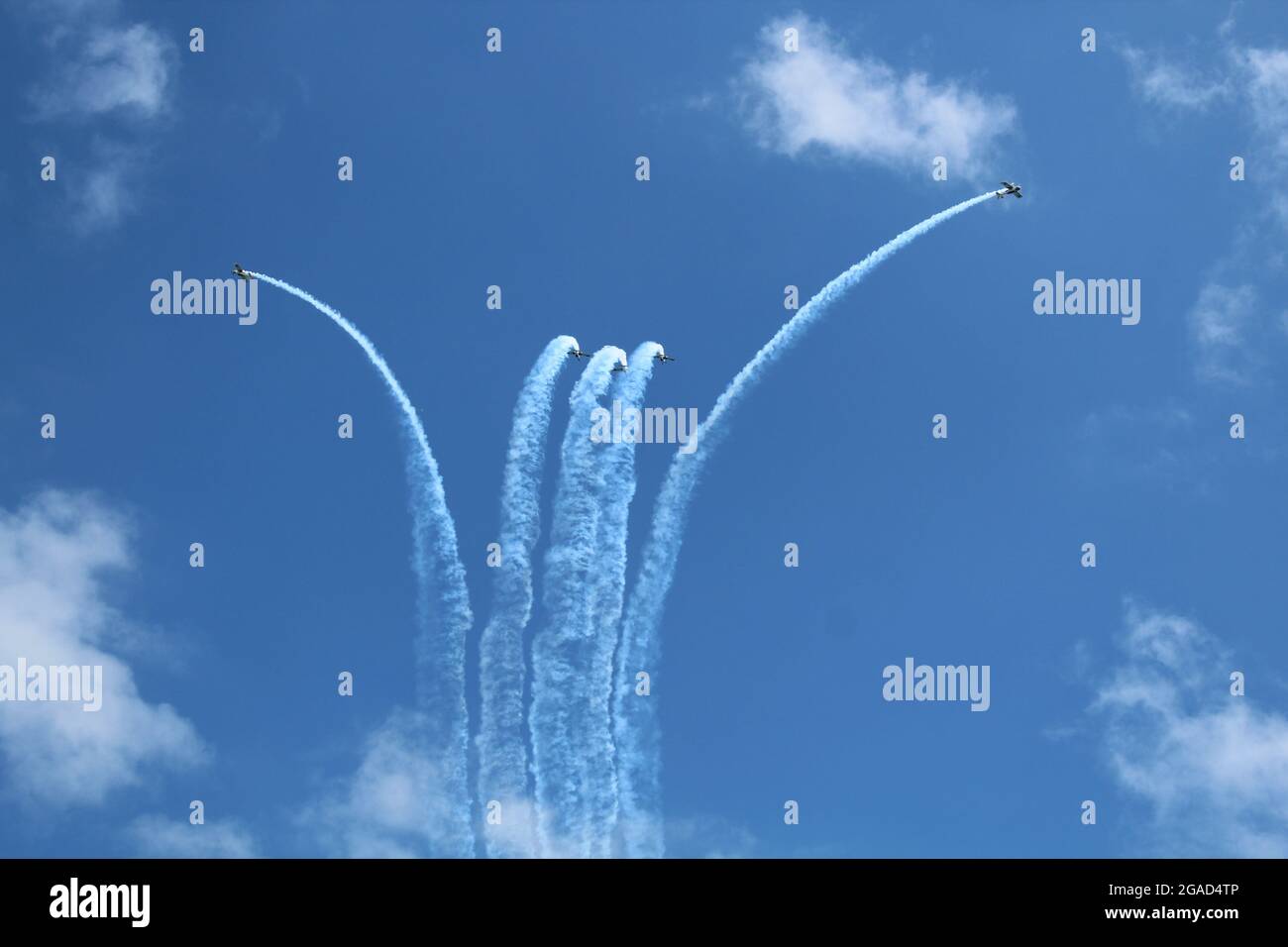 Acrobatic aricraft flying high speed maneuvers Stock Photo