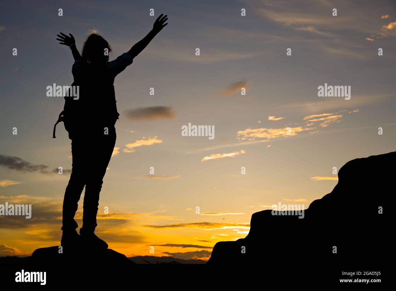 Standing on top of a mountain sunset hi-res stock photography and ...