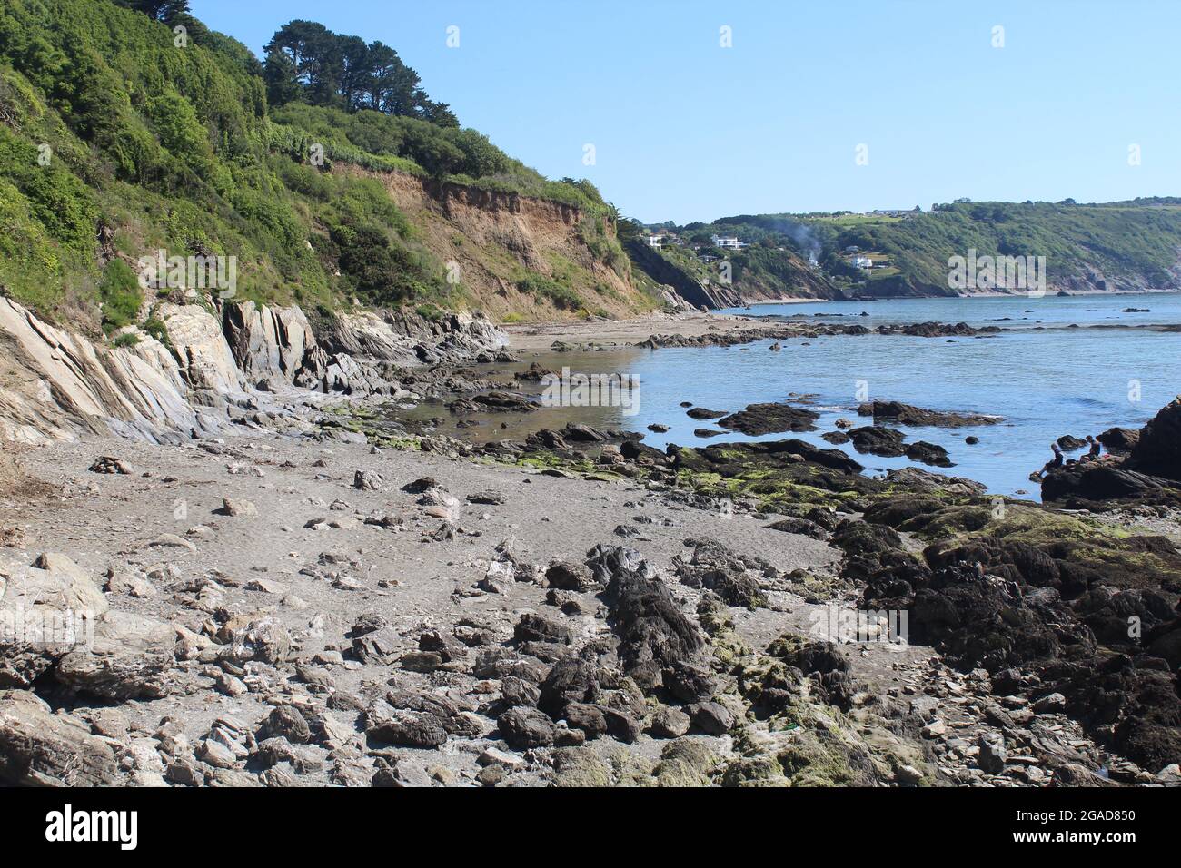 rocks gravel sand shell beach Stock Photo