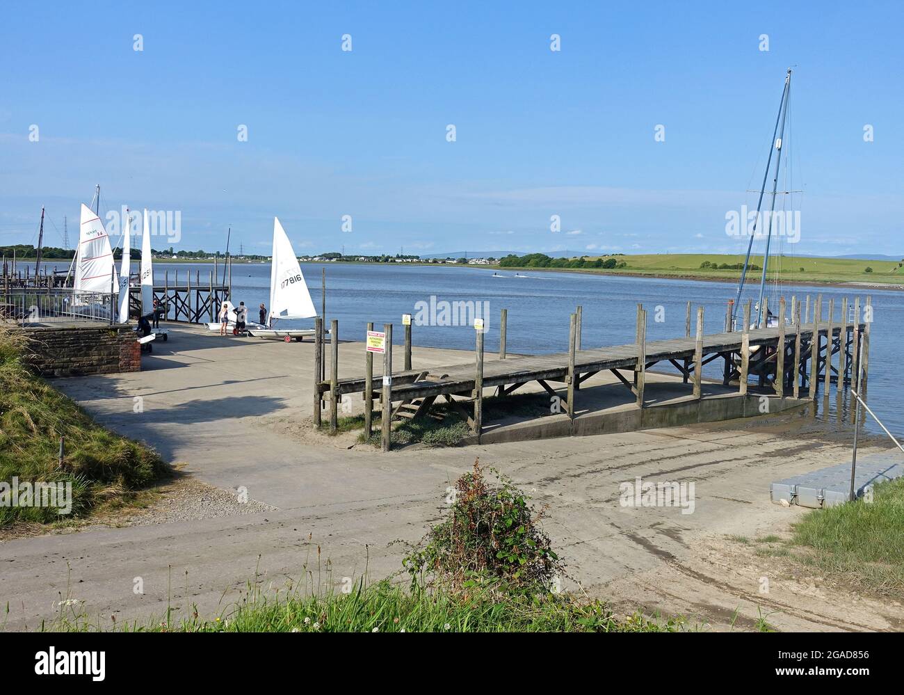 Sailing dinghies preparing for a race at the Blackpool and Fleetwood Yacht Club on the River Wyre estuary, Lancashire Stock Photo