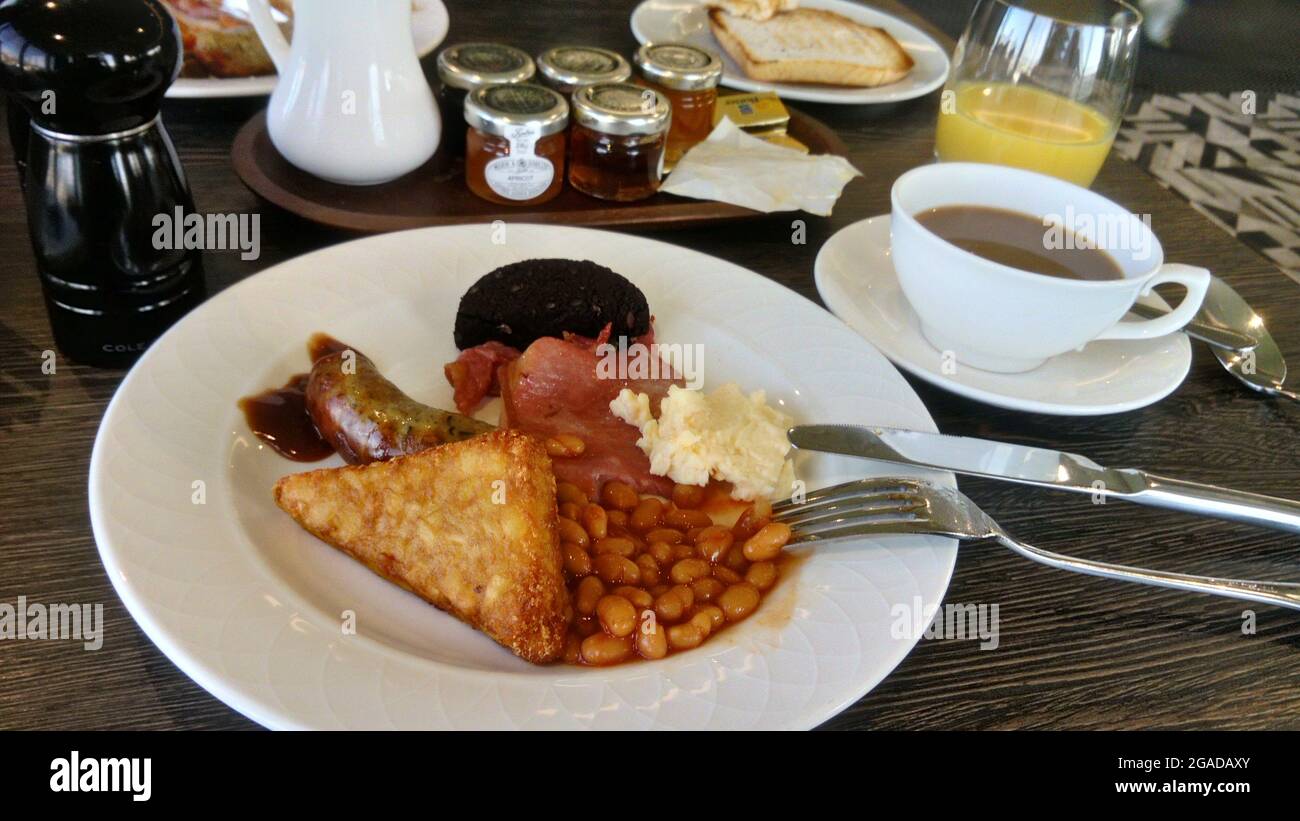Full English Breakfast with coffee toast and jam Stock Photo