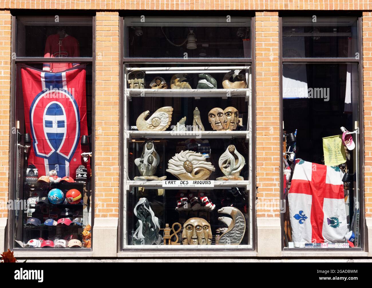 Iroquois Amerindian art and sculpture in a shop window in Montreal, Quebec, Canada Stock Photo