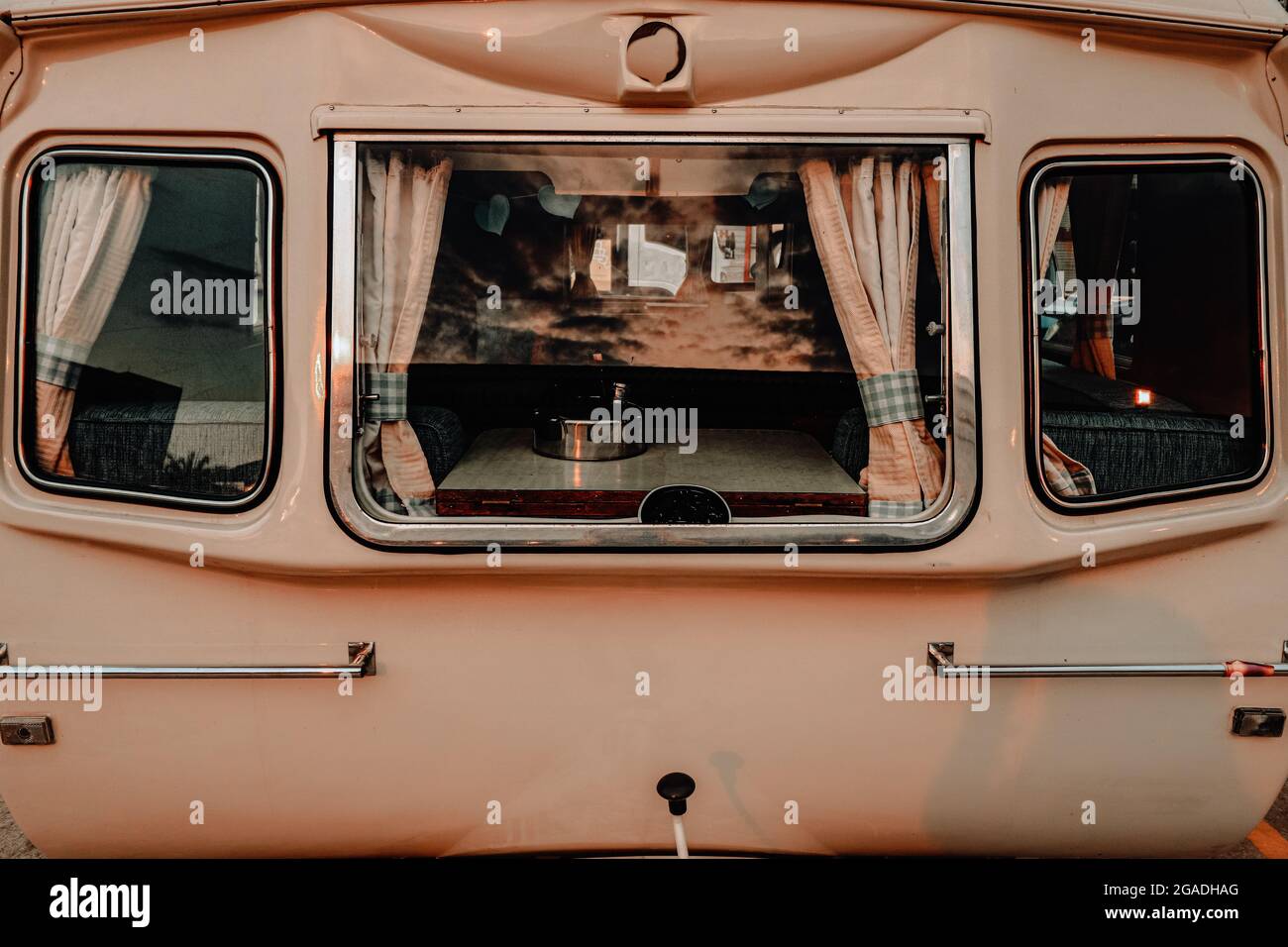 Bus Inside Window View inside a vintage cute bus through a small window with curtains ...