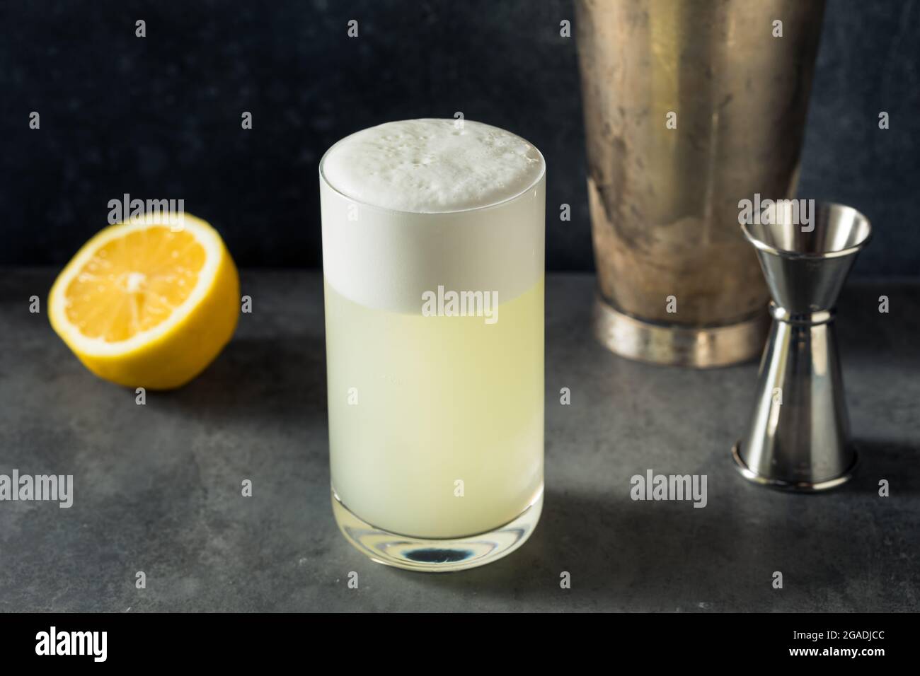 Boozy Refreshing Lemon Gin Fizz with an Egg White Stock Photo Alamy
