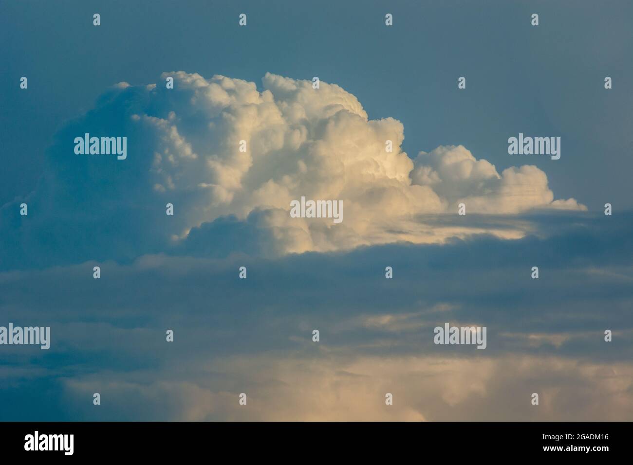 Cumulus clouds against the blue sky, spring day Stock Photo
