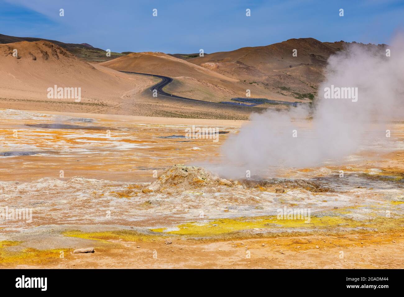 steam rises from sulphurous mud pools in the surreal lunar landscape area of hverir in the namafjall region to the east of lake myvatn Stock Photo