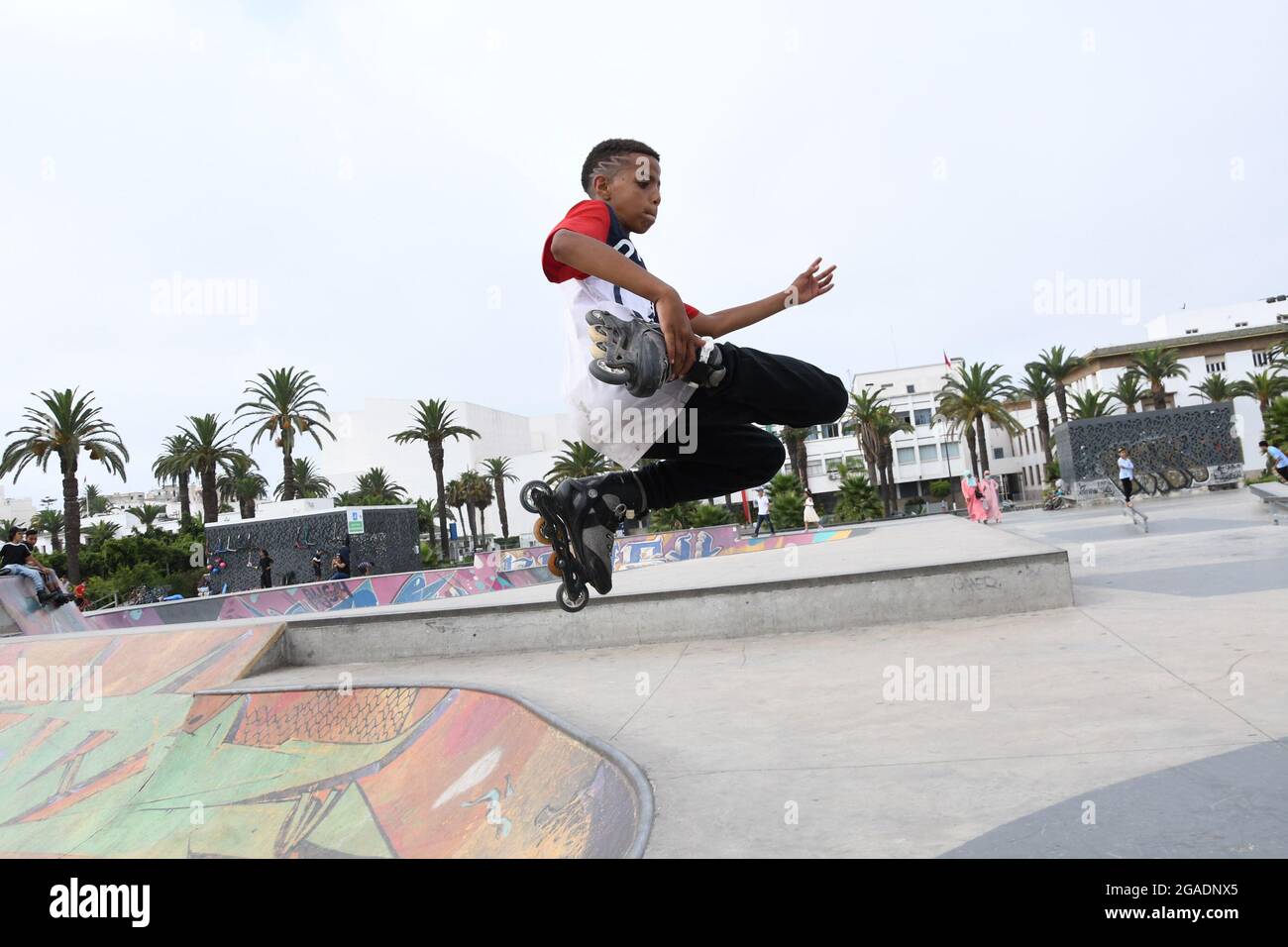 210730) -- CASABLANCA, July 30, 2021 (Xinhua) -- A boy roller skates in a  park in Casablanca, Morocco, on July 29, 2021. (Photo by Chadi/Xinhua Stock  Photo - Alamy